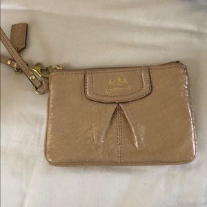 Champagne gold Coach wristlet